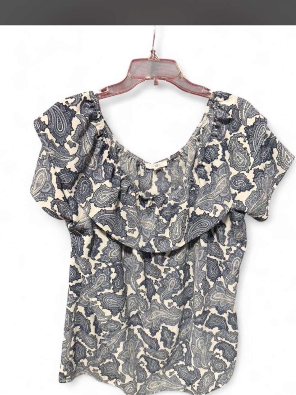 Roz & Ali blouse featuring a classic navy and white paisley pattern